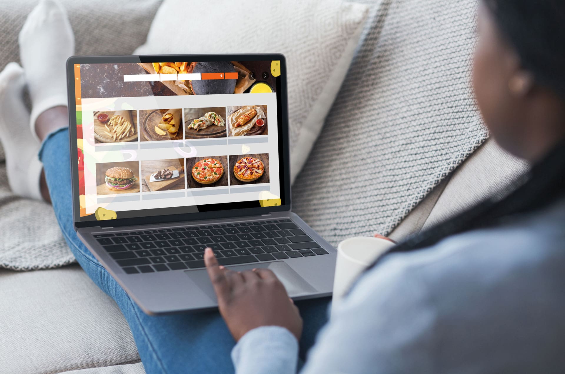 black-woman-using-laptop-ordering-food-delivery-on-2023-11-27-05-12-26-utc